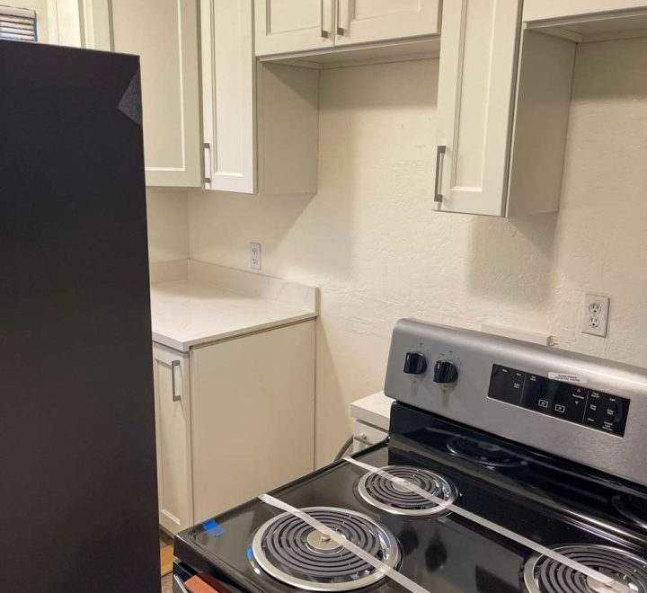 kitchen cabinet with new gas range